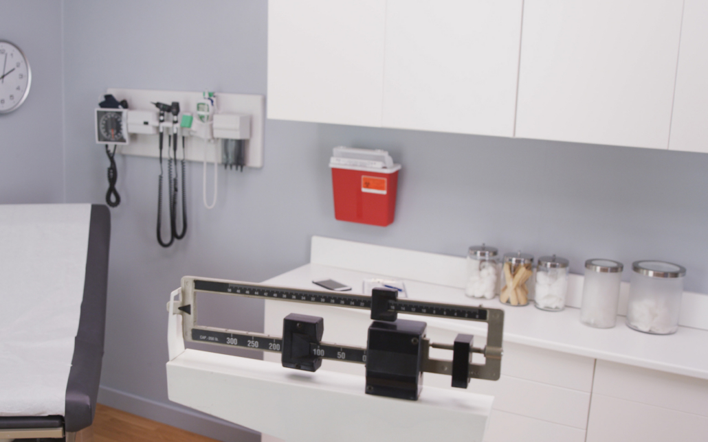 Close Up Of Medical Office Cabinets And Equipment. Interior Hospital Room With Medical Instruments